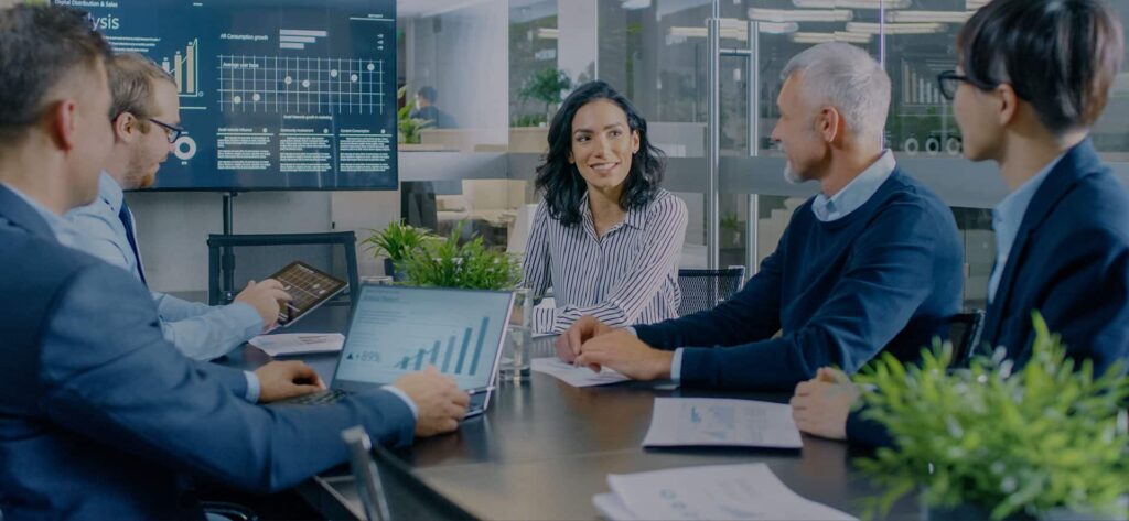 Group around conference room table